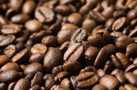 Roasted coffee beans background - full frame detail. Stock Photos