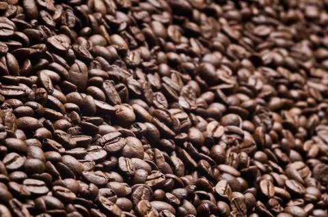 Roasted coffee beans background - full frame detail. Stock Photos