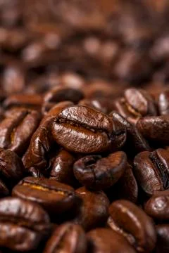 Roasted Coffee beans background. Stock Photos