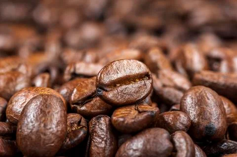 Roasted Coffee beans background. Stock Photos