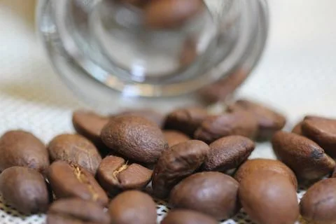Roasted coffee beans with background Stock Photos