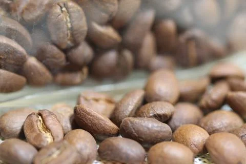 Roasted coffee beans with background Stock Photos