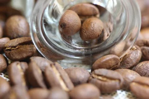 Roasted coffee beans with background Stock Photos