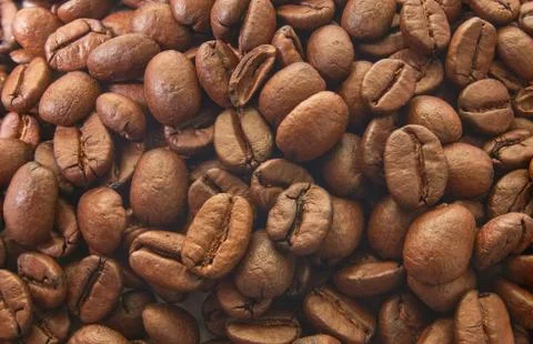Roasted coffee beans with background Stock Photos