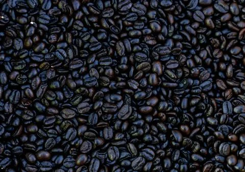 Roasted coffee beans background. Stock-Fotos
