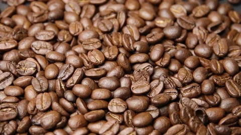 Roasted coffee beans background. Roasted coffee bean Stock Footage 197050016