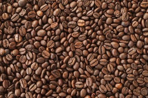 Roasted coffee beans, background texture Stock Photos