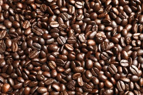 Roasted coffee beans as background, top view 写真素材