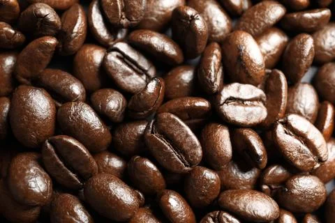Roasted coffee beans as background, top view Stock Photos