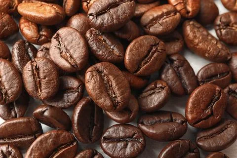 Roasted coffee beans as background, top view Stock Photos