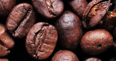 Roasted Coffee Beans Background. Video Loop. Close-Up 動画素材 140995127