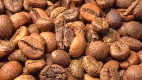 Roasted coffee beans. Camera above coffee beans close-up Stock Photos