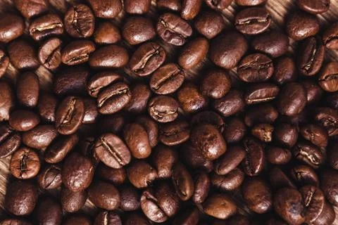 Roasted coffee beans, can be used as a background. Stock Photos