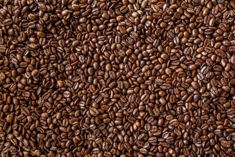 Roasted coffee beans, can be used as a background Stockfoto's
