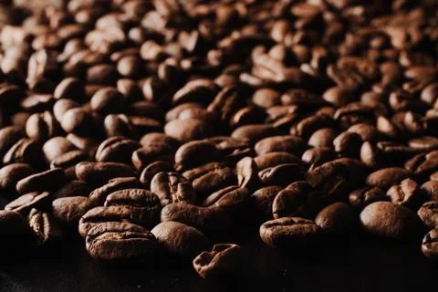 Roasted coffee beans, can be used as background. Coffee production concept fo Stock Photos