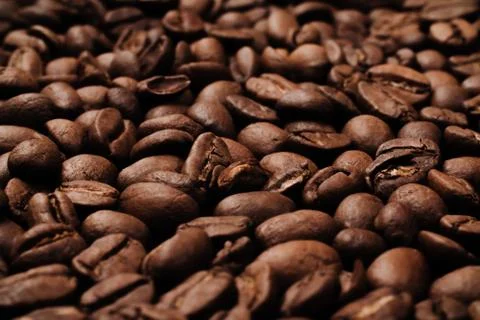 Roasted coffee beans, can be used as background. Coffee production concept fo Stock Photos