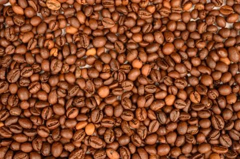 Roasted coffee beans close-up. Background image, texture Stock Photos