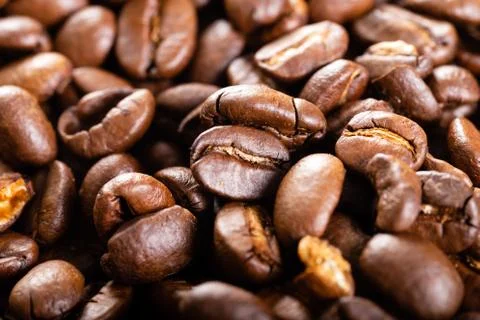 Roasted coffee beans close up. Background. Stock Photos