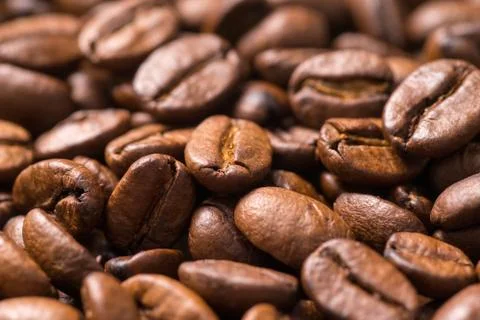 Roasted coffee beans close up, full frame background Stock Photos