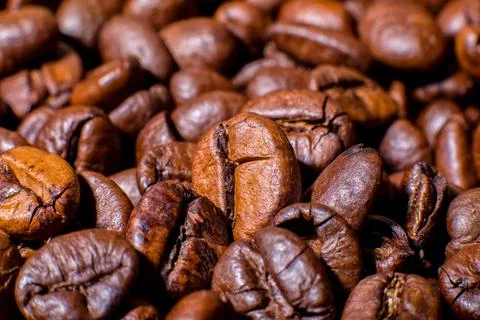 Roasted coffee beans close-up macro photo Stock Photos