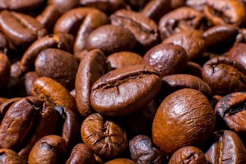 Roasted coffee beans close-up macro photo Stock Photos