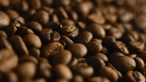 Roasted coffee beans close-up. Mixed dark coffee 库存影片 128361870