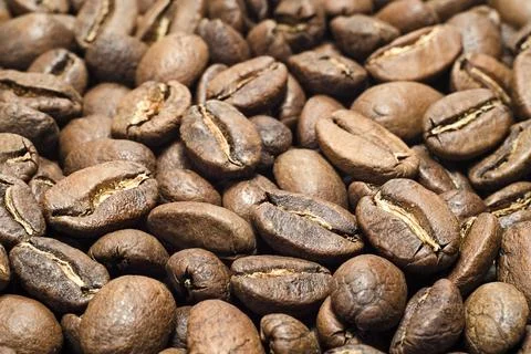 Roasted coffee beans close up Stock Photos