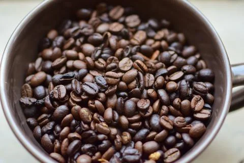 Roasted coffee beans as a close up Stock Photos