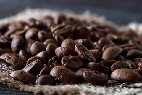 Roasted coffee beans close-up selective focus Stock Photos