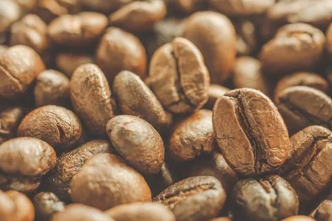 Roasted coffee beans closeup background Foto stock