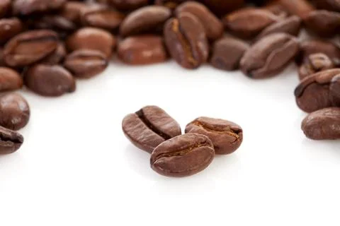 Roasted coffee beans in closeup Stock Photos