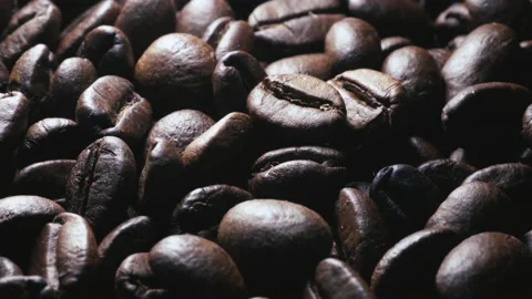 Roasted coffee beans in a cloth bag. Smoke from coffee roasting. Stock Footage 157315618
