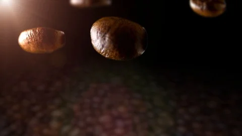 Roasted coffee beans with coffee dust falling down in front of dark background Stock Footage 95734878