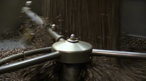 Roasted coffee beans in the coffee roaster Stock Footage 39675780