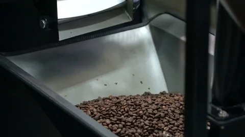 Roasted coffee beans in a coffee roaster Stock Footage 70425405