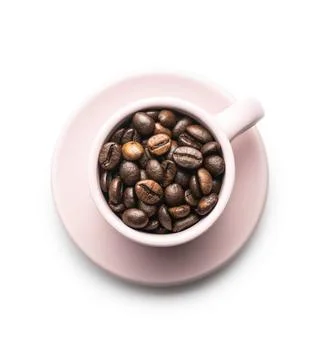 Roasted coffee beans in cup isolated on white background. Roasted coffee b... Stock Photos