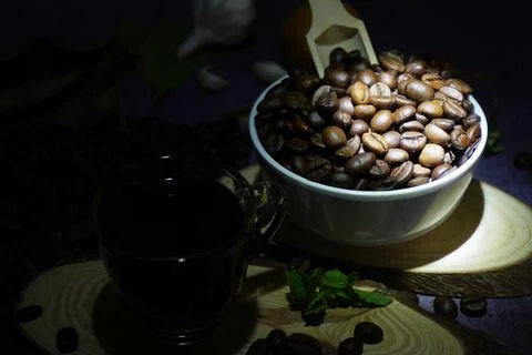 Roasted coffee beans in a cup Stock Photos