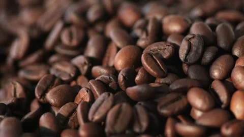 Roasted coffee beans with dark color and rich aroma, ideal for espresso, latte Stock Footage 278023594