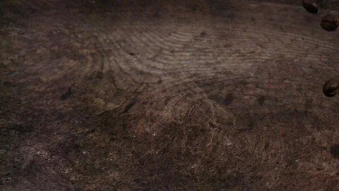 Roasted coffee beans dropping into a wooden bowl in slowmotion Stock Footage 99060071