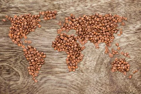 Roasted coffee beans earth map Stock Photos
