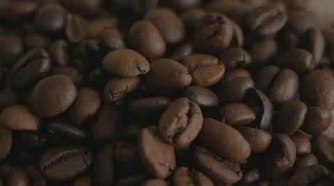 Roasted coffee beans. Falling coffee beans. Close-up. Stock Footage 43810619