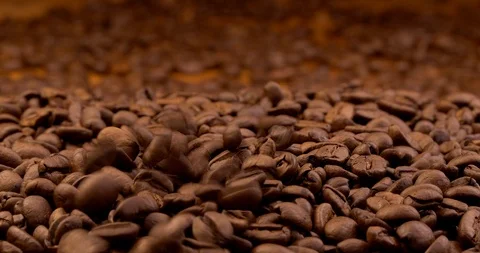 Roasted coffee beans falling down Stock Footage 90630226