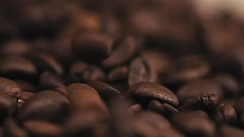 Roasted coffee beans falling down Stock Footage 138869288