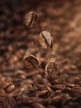 Roasted coffee beans falling down, with copy space Stock Photos