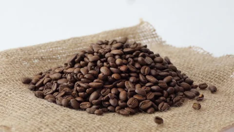 Roasted Coffee Beans falling. Fragrant coffee beans are roasted Slow motion Stock Footage 195122655