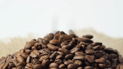 Roasted Coffee Beans falling. Fragrant coffee beans are roasted Slow motion Stock Footage 196009869