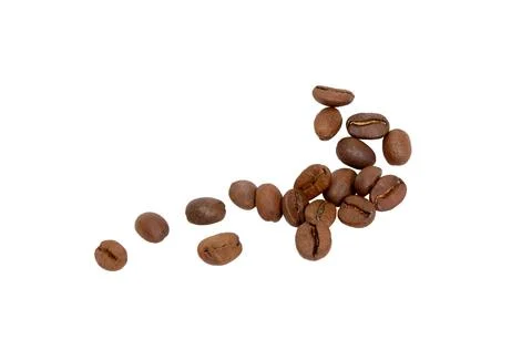 Roasted coffee beans falling  isolated on white. Stock Photos