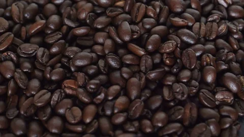 Roasted coffee beans falling in slow motion 180fps Stock Footage 78155570
