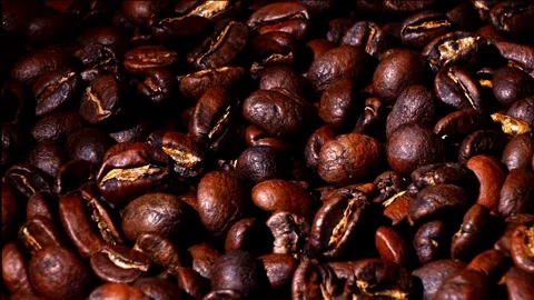 Roasted Coffee Beans Falling in Slow Motion Macro Stock Footage 323396848