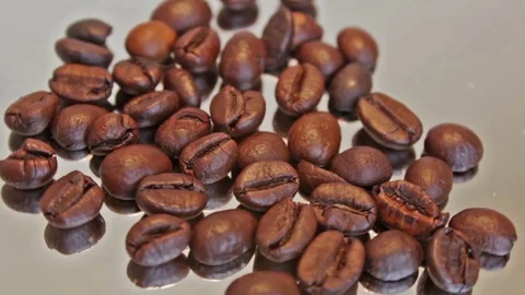 Roasted coffee beans on grey background seamless rotating Stock Footage 80353659